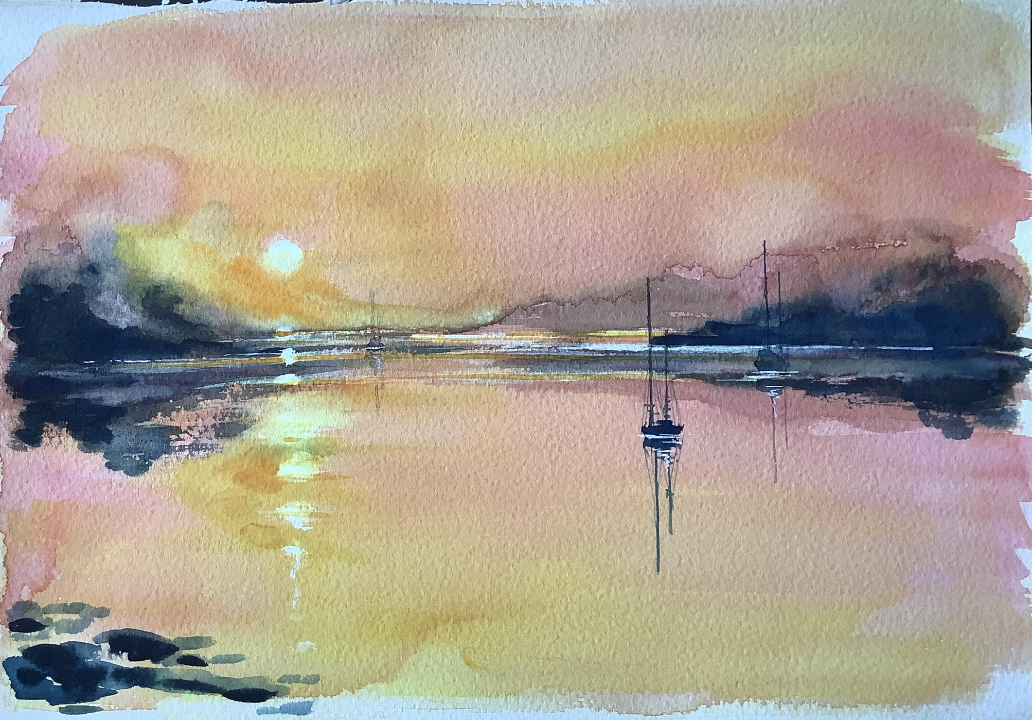 Small boats sailing in for the night