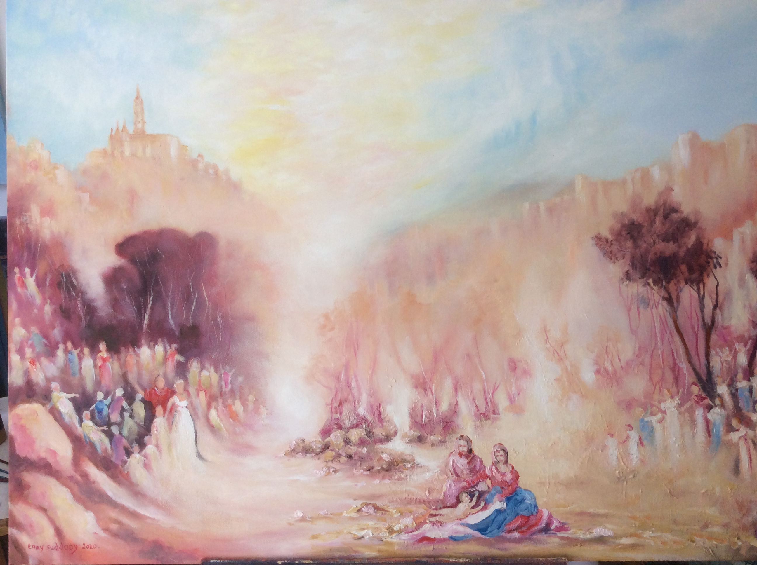 A community gathered up in a sunset setting