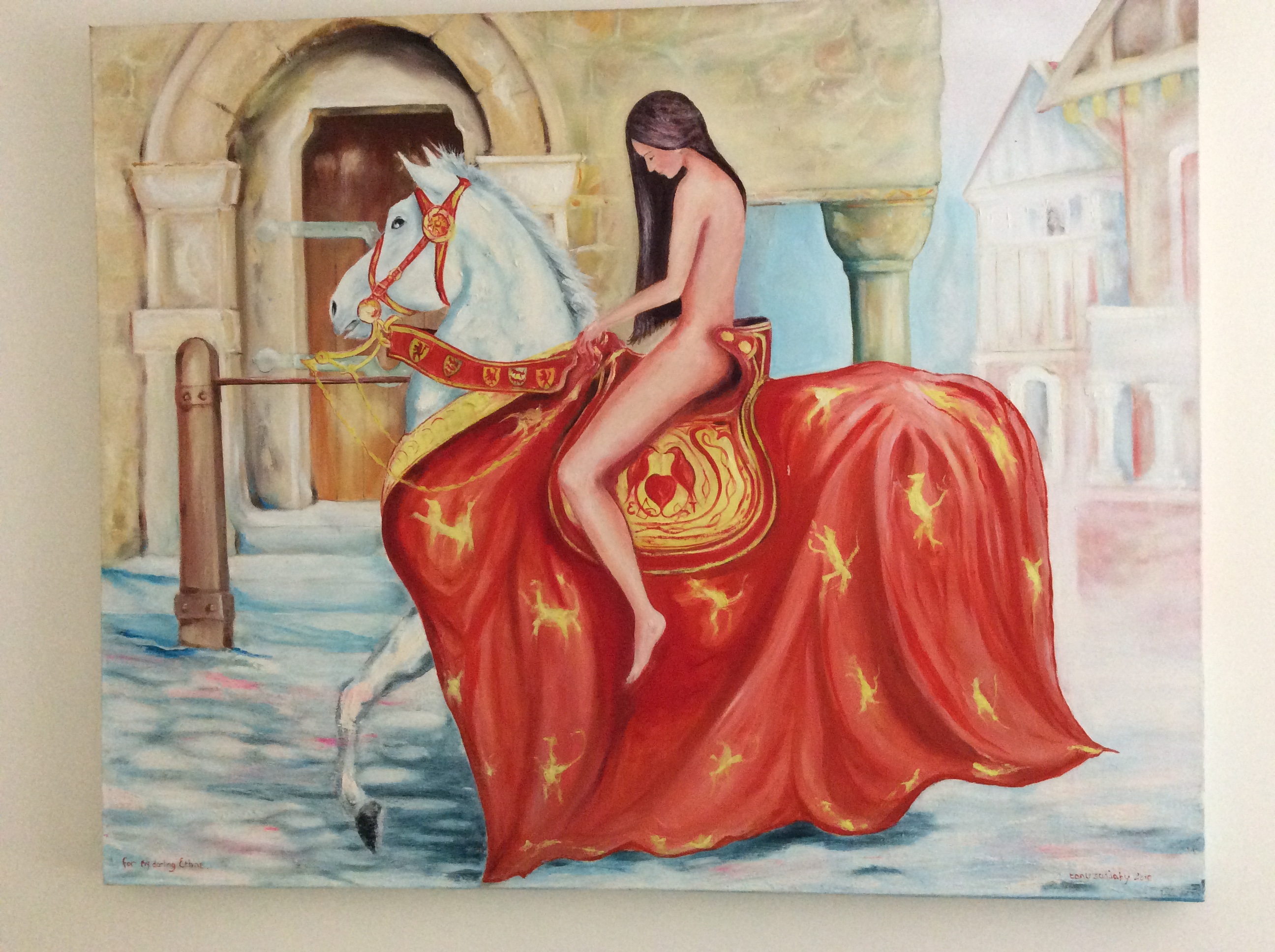 A lady on a horse arriving back to her village
